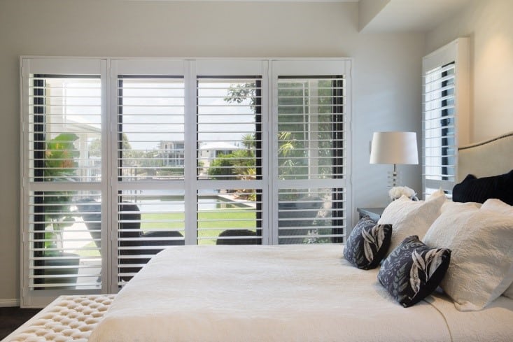 White shutters in bedroom 